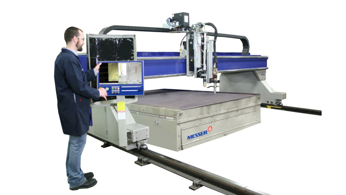 A man using the Titan III machine from Messer.